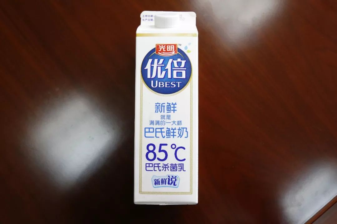 光明牛奶包装盒上标识“85℃”是否侵权85度C品牌的商标权？